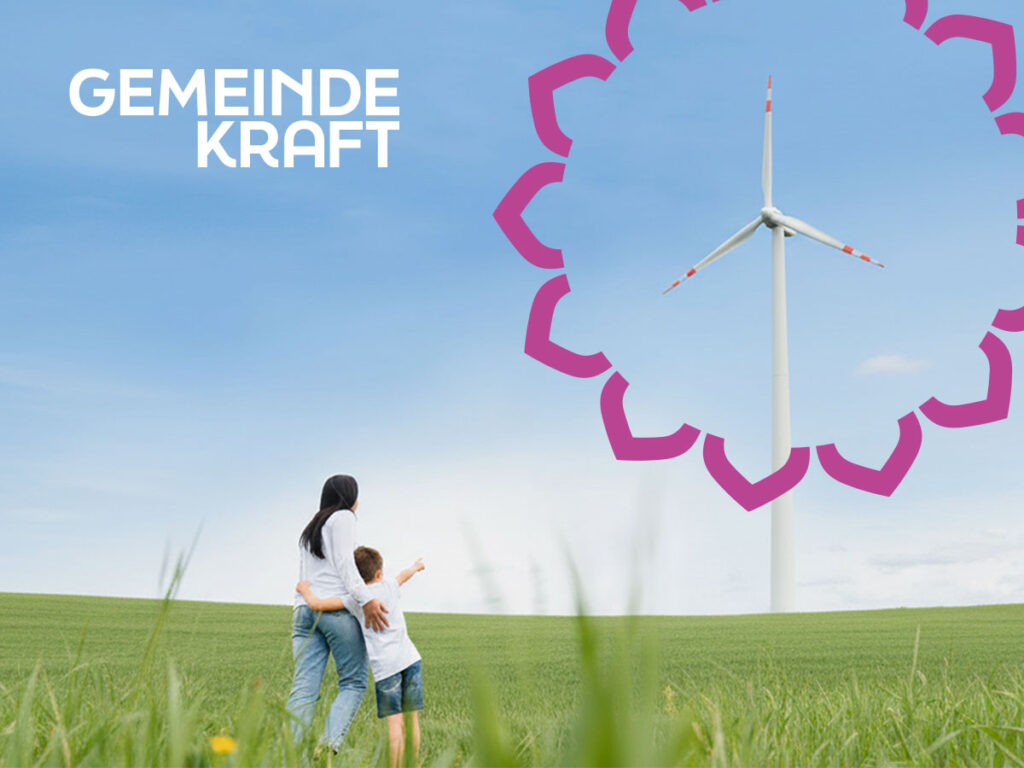 Keyvisual-Foto einer Freu mit Kind auf einer Wiese mit einem Windrad im Fokus vom "Kreis der Möglichkeiten"